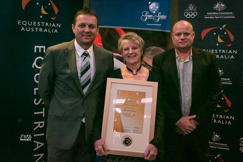 Sons Warren &amp;amp; Peter and Wife Lyn accept Bert's HOF award.